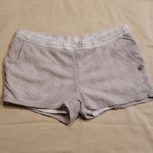 Roxy white shorts with lace overlay and pockets